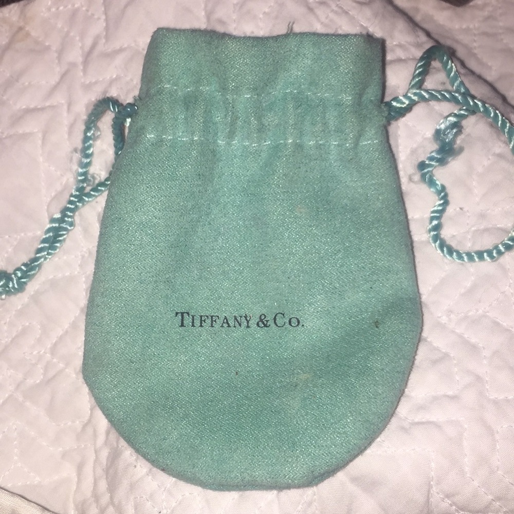 Small Tiffany bag. Worn out a bit with few stains